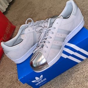 Grey adidas with metal toe. Perfect condition.